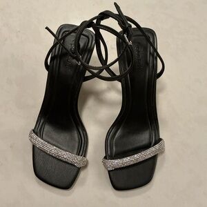 Chic Black Heels with Silver Embellishments